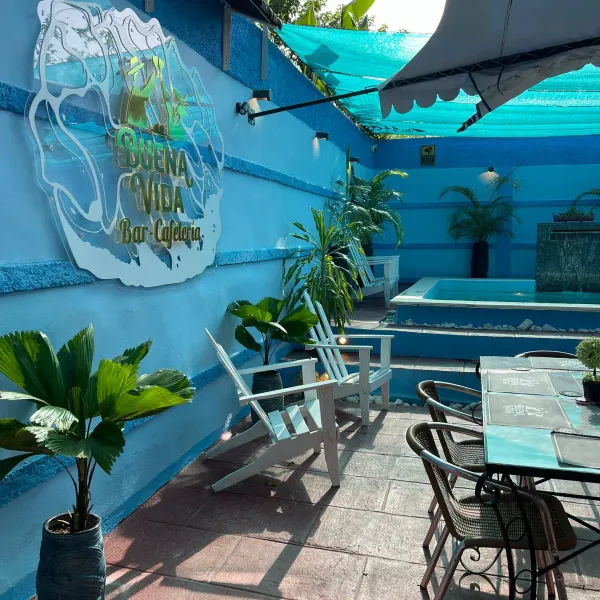 Vive la "Buena Vida" en nuestro exclusivo ambiente familiar, donde la diversión y el relax se unen. 
Disfruta de una piscina con zona infantil, una exquisita selección gastronómica que va desde picaderas hasta platos gourmet de mariscos y carnes, y una barra con cócteles artesanales, cervezas frías y tragos premium. Con un servicio cálido y dedicado, somos el destino perfecto para compartir momentos inolvidables bajo el sol, junto a quienes más quieres.