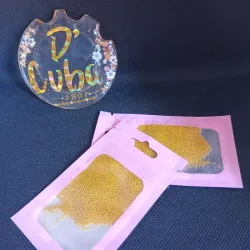 Paquetes de balines dorados