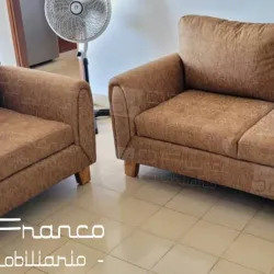 Conjunto de sofá y butaca