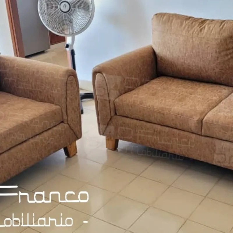 Conjunto de sofá y butaca