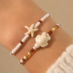 Conjunto de 2 pulseras.