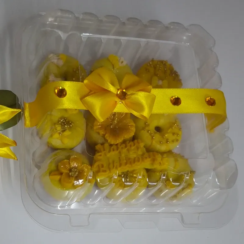 Set de 9 minidonitas decoradas en su estuche.