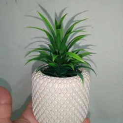 Búcaro calado con planta 