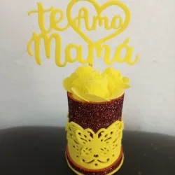 Búcaro con todas amarillas y cartel