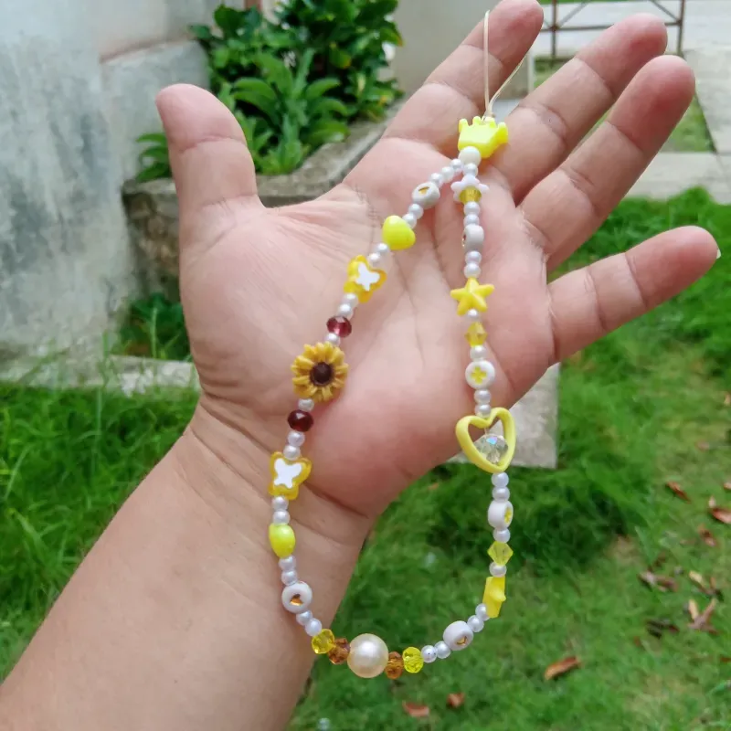 Colgante amarillo y blanco 