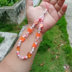 Colgante anaranjado y blanco