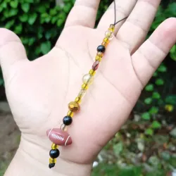 Colgante con pelota carmelita 
