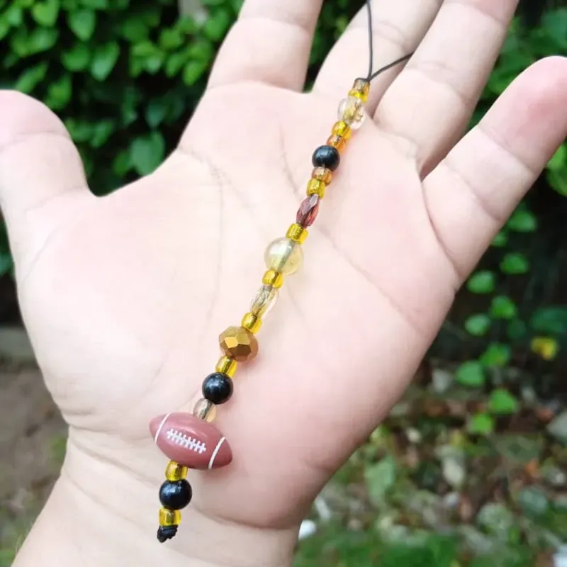 Colgante con pelota carmelita 