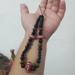 Colgante con pelotas para varón 