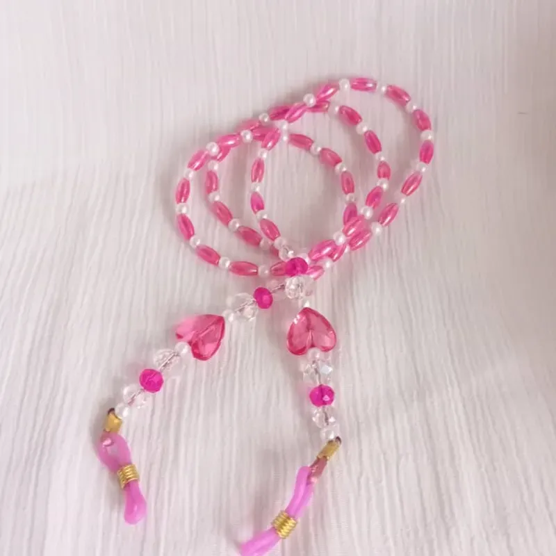 Colgante de espejuelos rosado de perlas