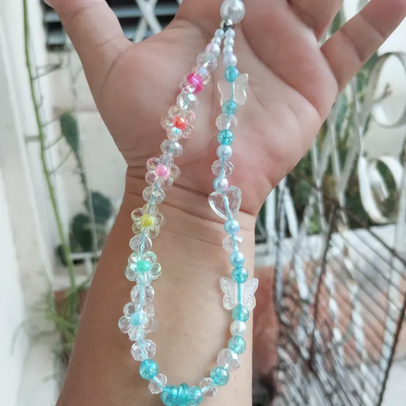 Colgante de flores y perlas de swaroski 
