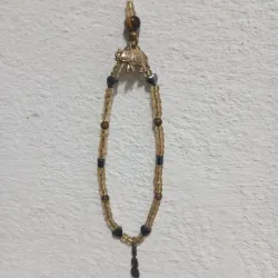 Colgante dorado con elefante 
