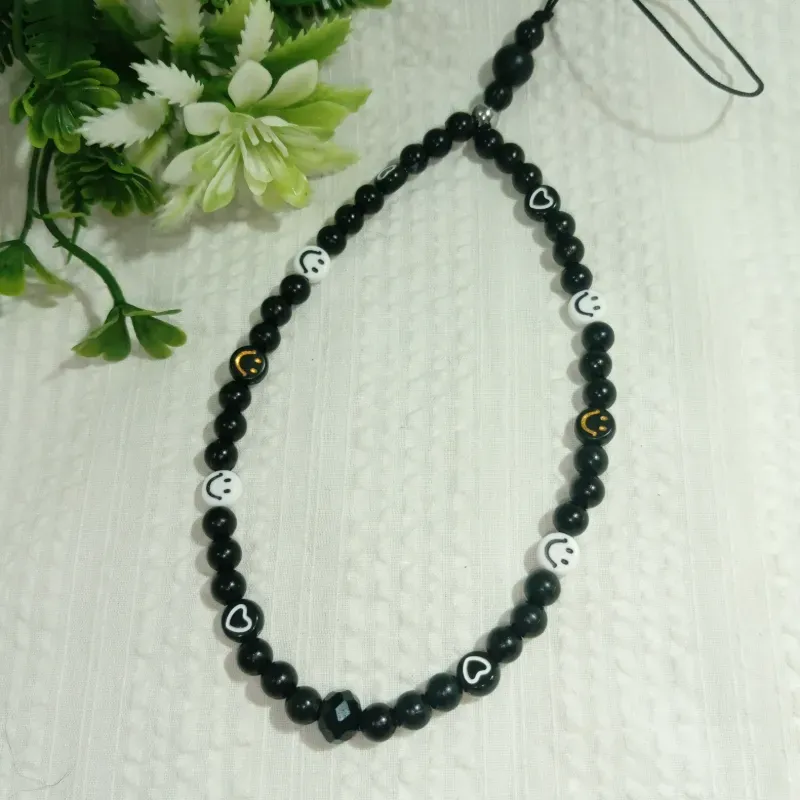 Colgante negro con emogis