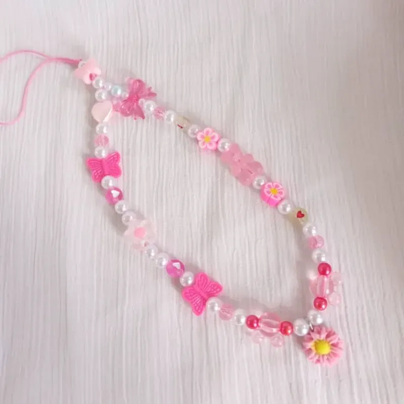 Colgante rosado con osito y flor