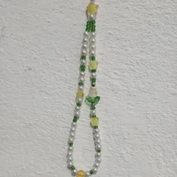 Colgante verde y amarillo con flor de cristal 