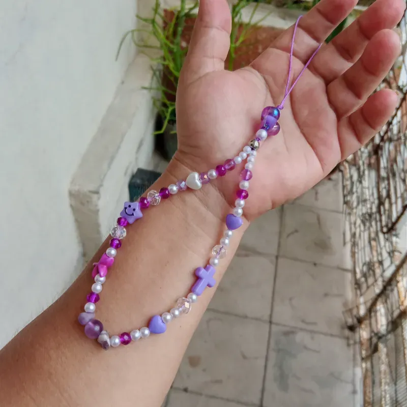 Colgante violeta con cruz