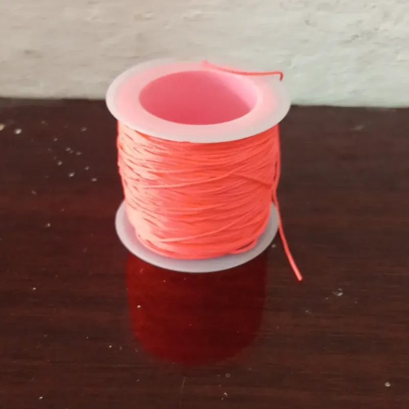 Hilo chino naranja 0.6 x metro