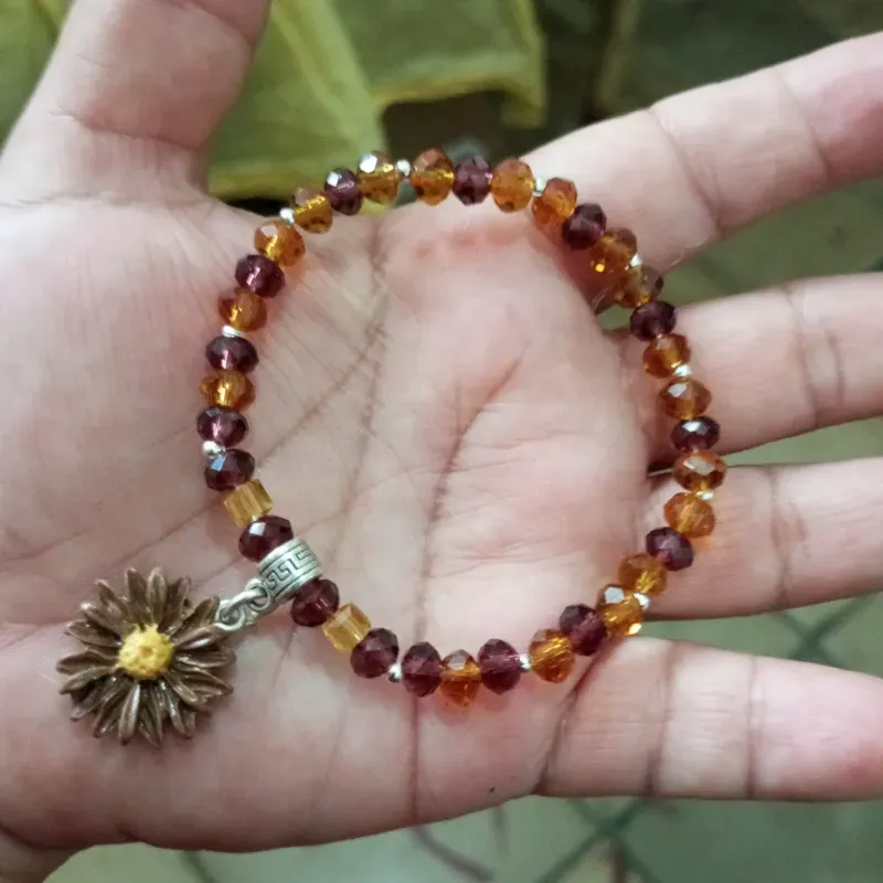 Pulso de swaroski carmelita con flor 