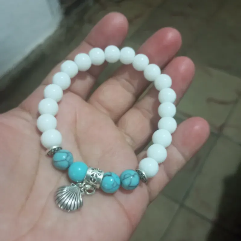 Onix blanco y Howlita azul dije de concha