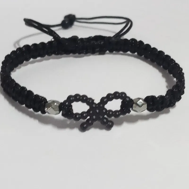 Pulsera negra con lazo coquette