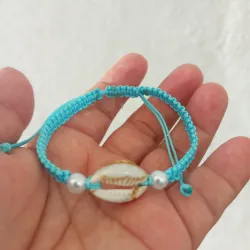 Pulso azul con caracol 