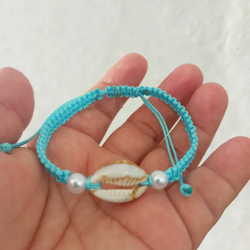 Pulso azul con caracol 