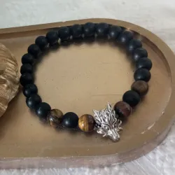 Pulso de hombre Onix negro Ojo de Tigre dije de lobo