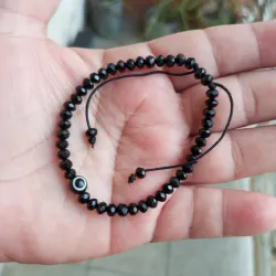 Pulso de ojo turco negro y swaroski 4mm