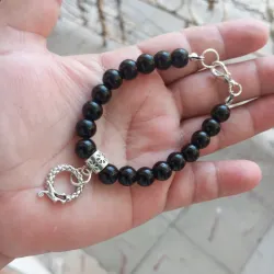 Pulso de ónix y dije de ouroburus