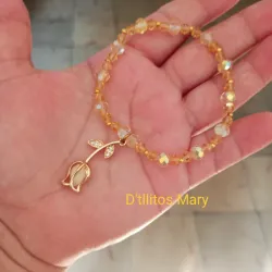 Pulso de swaroski y flor dorada 