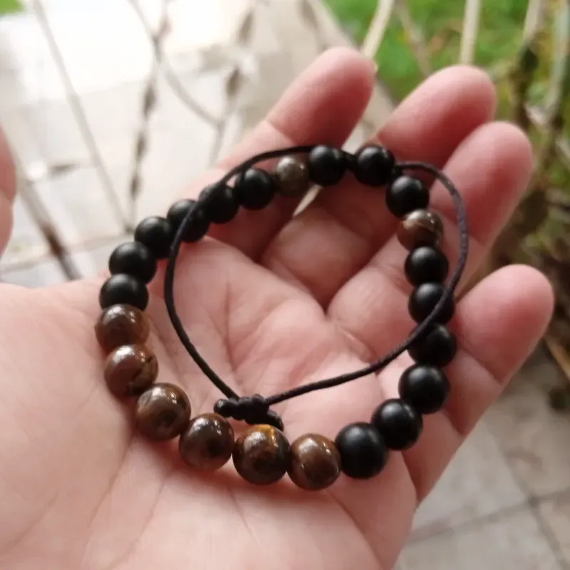 Pulso onix negro y ojo de tigre 8mm 