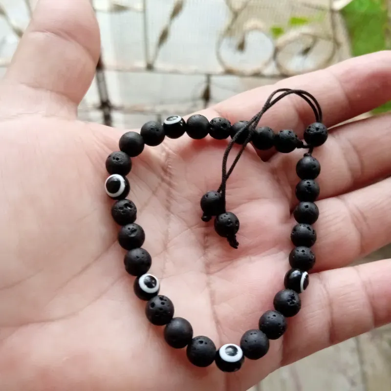 Pulso piedra volcánica y ojo turco negro 