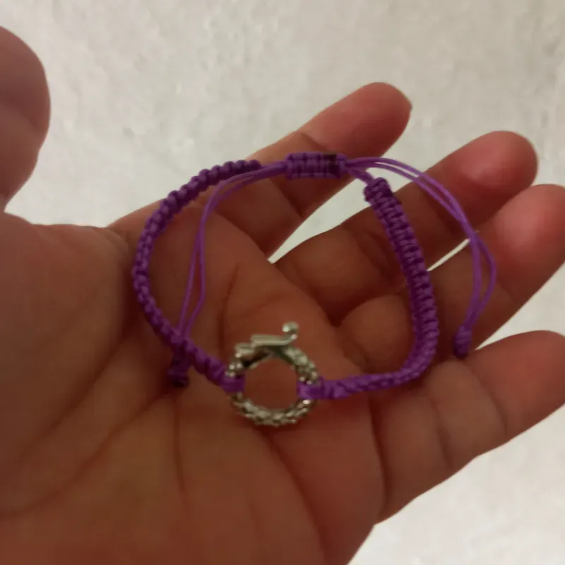 Pulso violeta con dragón 