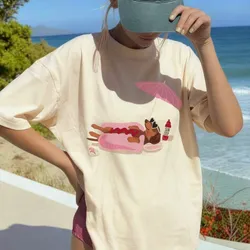 Pullover beis con estampado de perrito