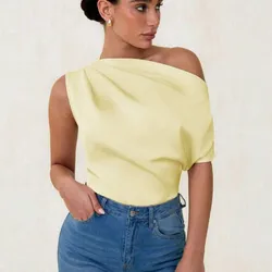 Blusa amarilla asimétrica