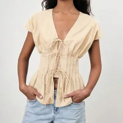 Blusa amarilla con lazos