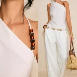 Blusa asimétrica con cuencas