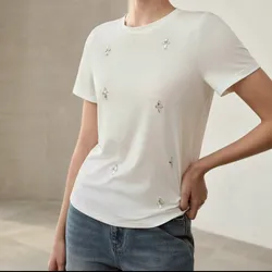 Blusa de manga corta con detalles plateados