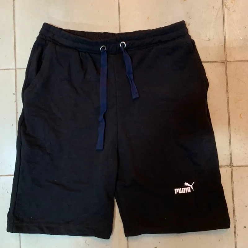 Short puma negro