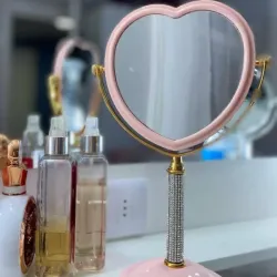 Espejo doble cara con aumento