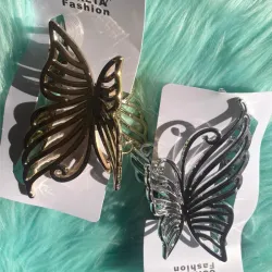 Pellizcos grandes forma de mariposa