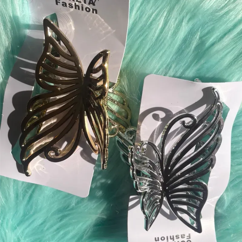 Pellizcos grandes forma de mariposa