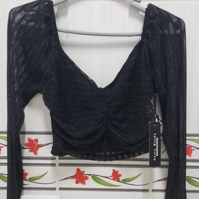 Blusa negra de brillo