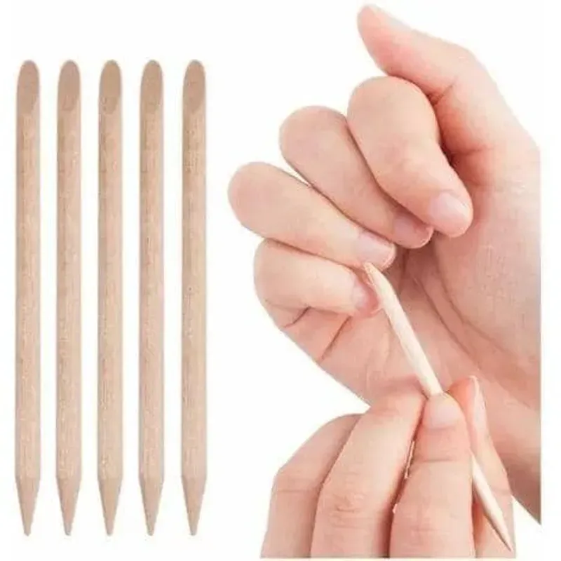 Palito naranjo empuja cutícula