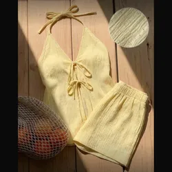 Conjunto amarillo de lazos en top