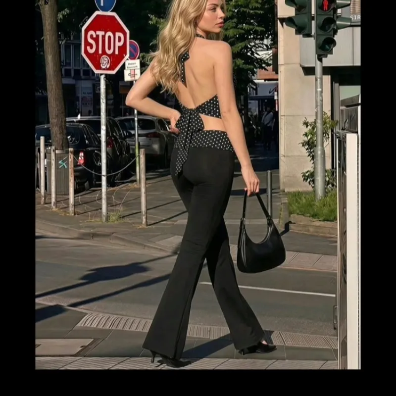 Conjunto negro con top de bolas