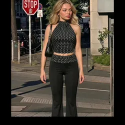 Conjunto negro con top de bolas