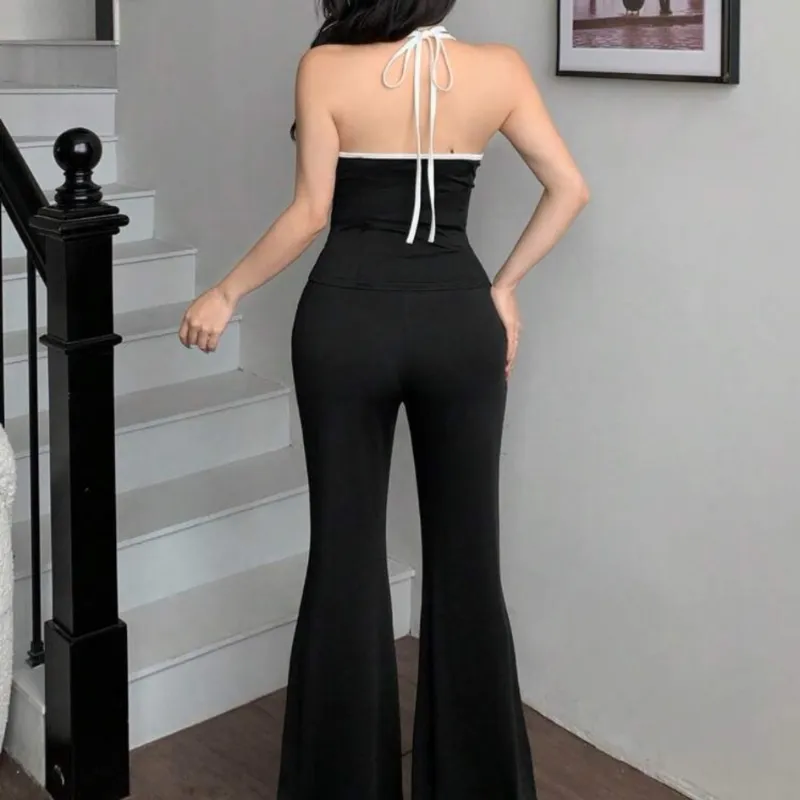 Conjunto negro de lazos blancos