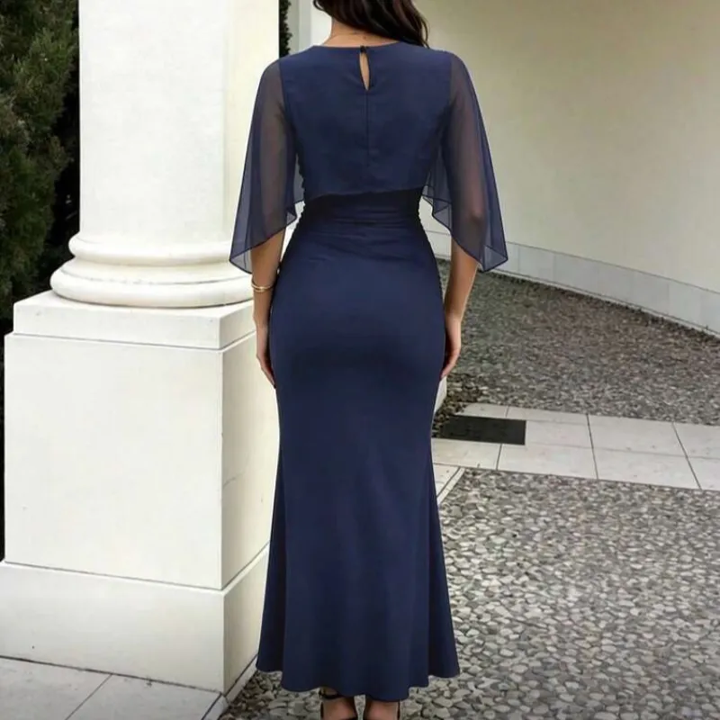 Vestido azul marino diseño de poncho