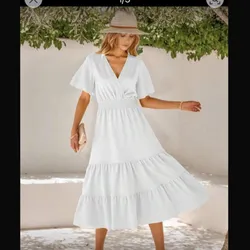 Vestido blanco ancho de mangas